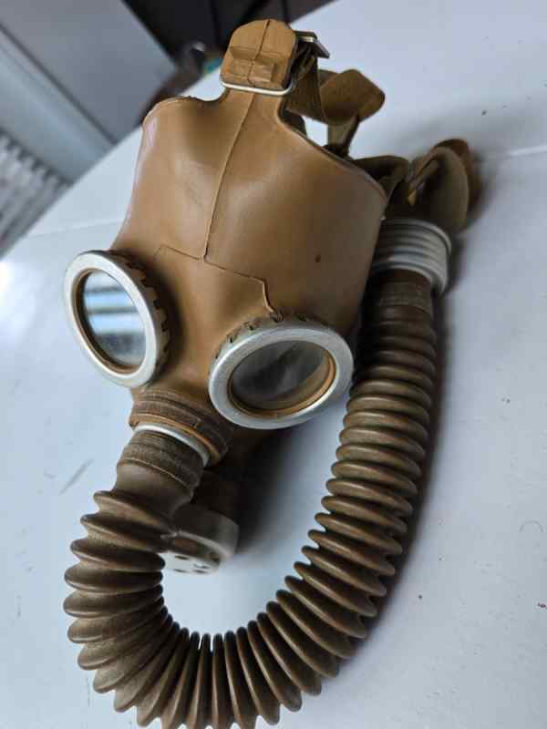 Military helmets, uniforms, binoculars, MG linked 